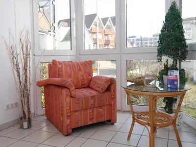 Ein Sitzbereich in der Unterkunft Apartment house Pinamar, Scharbeutz