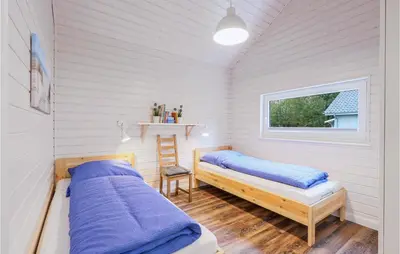 Ein Bett oder Betten in einem Zimmer der Unterkunft Awesome Home In Krems Iiwarderbrück