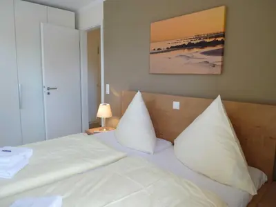 Ein Bett oder Betten in einem Zimmer der Unterkunft Ostsee Lodges zum Wohlfühlen