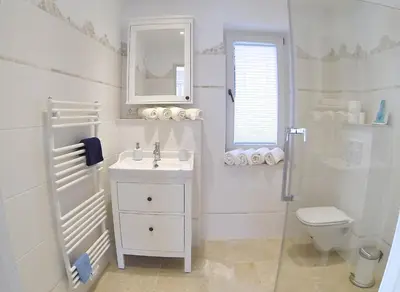 Ein Badezimmer in der Unterkunft Gästhuus - Urlaub aan de Ostsee
