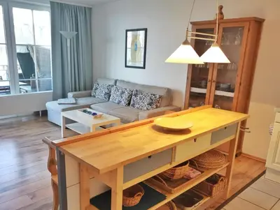 Ein Sitzbereich in der Unterkunft Apartmentvermittlung Mehr als Meer - Objekt 9
