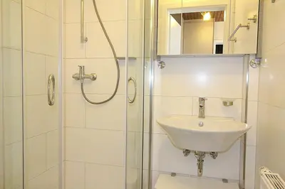 Ein Badezimmer in der Unterkunft Obj. 45* kleine, moderne FeWO 2 Pers. - nur 300 m zum Strand, W-LAN, Balkon