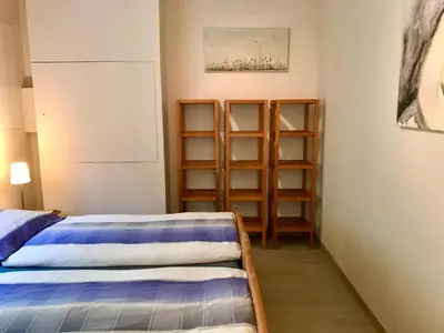 Ein Bett oder Betten in einem Zimmer der Unterkunft Ferienwohnung Am Königsberg