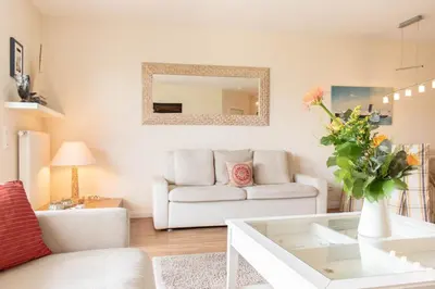 Ein Sitzbereich in der Unterkunft Ferienwohnung Soleil