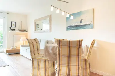 Ein Sitzbereich in der Unterkunft Ferienwohnung Soleil