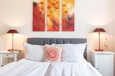 Ein Bett oder Betten in einem Zimmer der Unterkunft Ferienwohnung Soleil