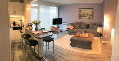 TV/Unterhaltungsangebot in der Unterkunft Pier 100 Ferienwohnung