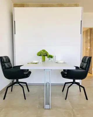 Ein Sitzbereich in der Unterkunft Blue City Apartments