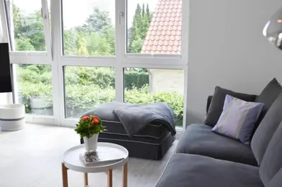 Ein Sitzbereich in der Unterkunft Ferienwohnung Küstentraum 2