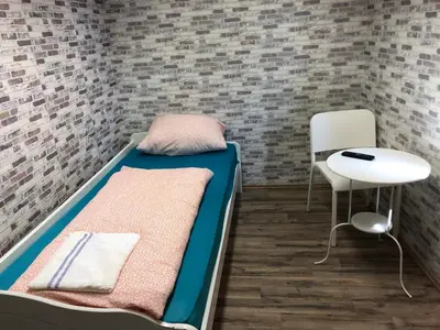 Ein Bett oder Betten in einem Zimmer der Unterkunft Pension Adler