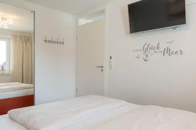 Ein Bett oder Betten in einem Zimmer der Unterkunft Ferienwohnung Baltic Mare