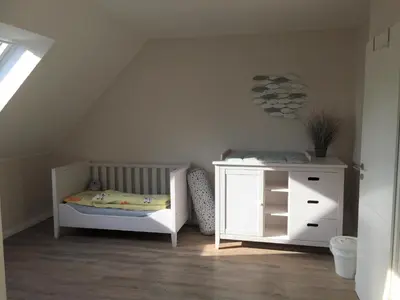 Ein Bett oder Betten in einem Zimmer der Unterkunft Ferienhaus Haffmeer