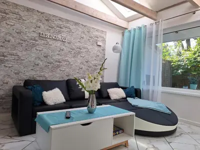 Ein Sitzbereich in der Unterkunft Ferienhaus Ellie