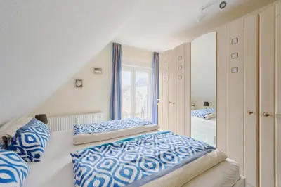 Ein Bett oder Betten in einem Zimmer der Unterkunft Ferienwohnung Hafennah Moba-Travel