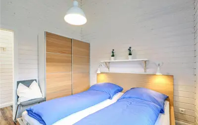 Ein Bett oder Betten in einem Zimmer der Unterkunft Stunning Home In Krems Iiwarderbrück