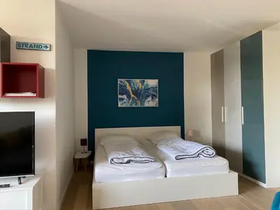 Ein Bett oder Betten in einem Zimmer der Unterkunft 50 Meter bis zum Strand - Lütje Loge