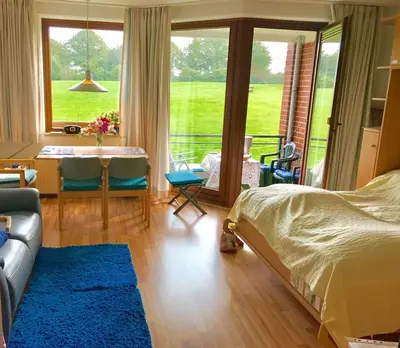 Ein Bett oder Betten in einem Zimmer der Unterkunft Travemünde am Hafen