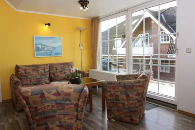 Ein Sitzbereich in der Unterkunft Appartementhaus Pinamar, Scharbeutz