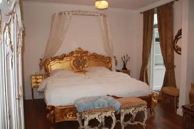 Ein Bett oder Betten in einem Zimmer der Unterkunft Hotel Lili Marleen