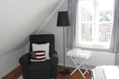 Ein Sitzbereich in der Unterkunft Hotel Lili Marleen