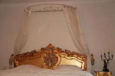 Ein Bett oder Betten in einem Zimmer der Unterkunft Hotel Lili Marleen