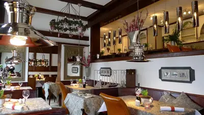 Ein Restaurant oder anderes Speiselokal in der Unterkunft Herzbergs.Ferienwohnungen Meerfühlen