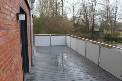 Ein Balkon oder eine Terrasse in der Unterkunft Dünenhaus Wohnung11