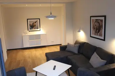 Ein Sitzbereich in der Unterkunft Dünenhaus Wohnung11