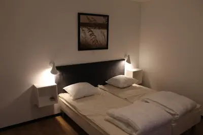 Ein Bett oder Betten in einem Zimmer der Unterkunft Dünenhaus Wohnung 13
