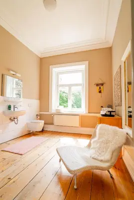 Ein Bett oder Betten in einem Zimmer der Unterkunft Schloss Harkensee