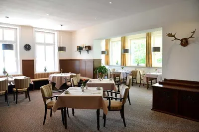 Ein Restaurant oder anderes Speiselokal in der Unterkunft Arnimsruh Hotel garni