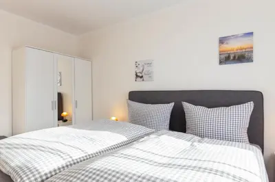 Ein Bett oder Betten in einem Zimmer der Unterkunft Ferienwohnung Abendsonne