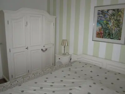 Ein Bett oder Betten in einem Zimmer der Unterkunft Residenz Weedkroog
