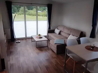 Ein Sitzbereich in der Unterkunft Natur-Campingplatz Salemer See