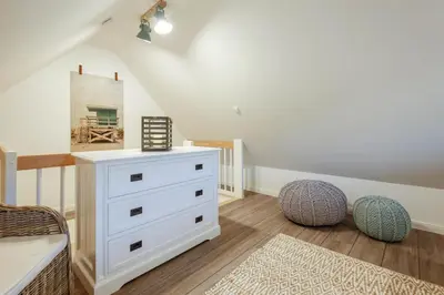 Ein Bett oder Betten in einem Zimmer der Unterkunft Ferienhaus NORTH COAST