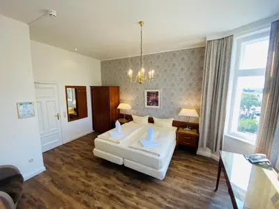Ein Bett oder Betten in einem Zimmer der Unterkunft Hotel Kaiserhof