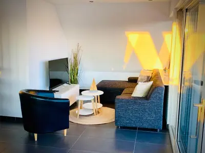Ein Sitzbereich in der Unterkunft FeWo SEEBLICK - Familien - Hunde - strandnah - Ostseeblick - Sauna & Wellness