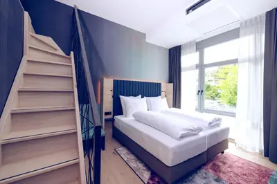 Ein Bett oder Betten in einem Zimmer der Unterkunft The Flamingo