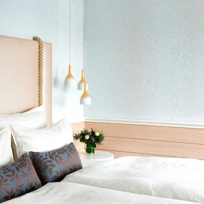 Ein Bett oder Betten in einem Zimmer der Unterkunft Hotel Der Seehof
