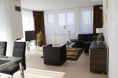 Ein Sitzbereich in der Unterkunft Ferienwohnung Yachtclub