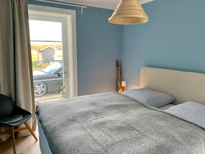 Ein Bett oder Betten in einem Zimmer der Unterkunft Reethus Linda