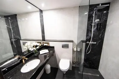 Ein Badezimmer in der Unterkunft PLAZA Premium Timmendorfer Strand