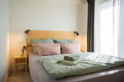 Ein Bett oder Betten in einem Zimmer der Unterkunft Ferien- und Seminarhaus Flunder & Hering