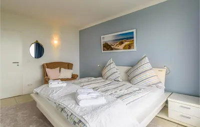 Ein Bett oder Betten in einem Zimmer der Unterkunft Lovely Apartment In Timmendorfer-Strand