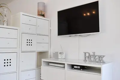 TV/Unterhaltungsangebot in der Unterkunft Ferienwohnung Sunshine Beachoase 106