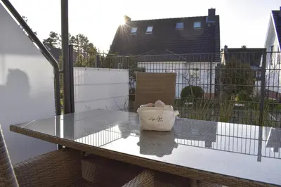 Ein Balkon oder eine Terrasse in der Unterkunft Ferienwohnung Sunshine Beachoase 106