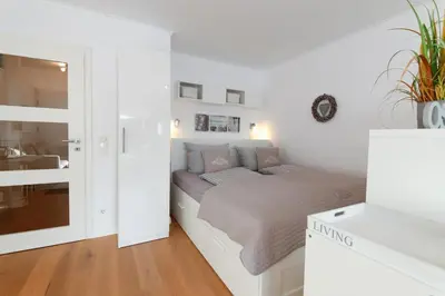 Ein Bett oder Betten in einem Zimmer der Unterkunft Ferienwohnung Sunshine Beachoase 106