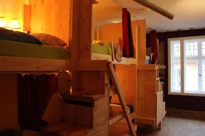 Ein Bett oder Betten in einem Zimmer der Unterkunft schickSAAL*