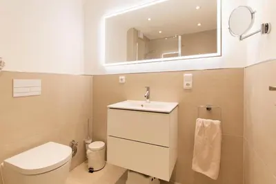 Ein Badezimmer in der Unterkunft Ferienwohnung Strandallee 18