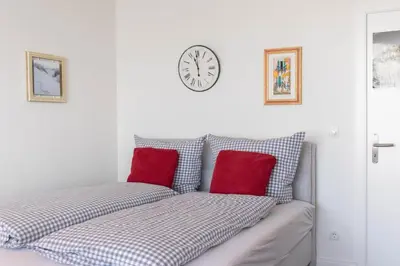 Ein Bett oder Betten in einem Zimmer der Unterkunft Residenz App 112 - Timmendorfer Strand